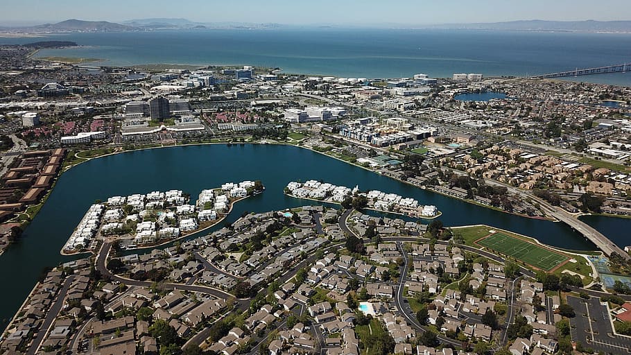 aerial photo of houses and neighborhoods on shoreline in Foster City